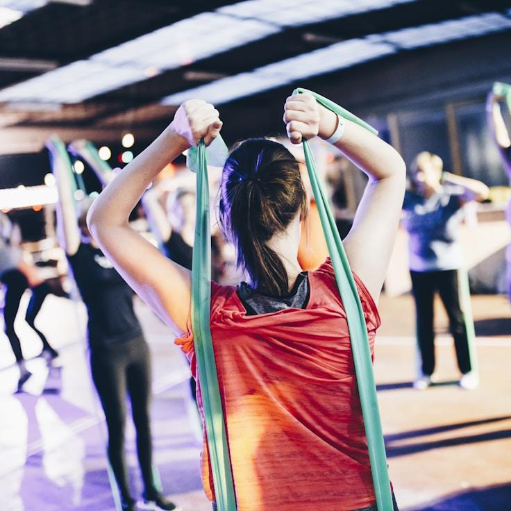 Group fitness class in a modern studio environment
